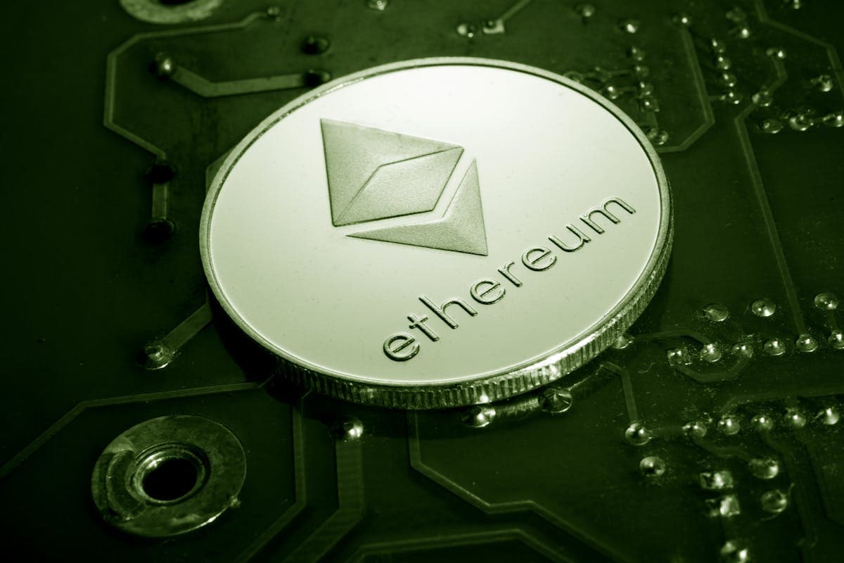 Ethereum coin on circuit board close-up